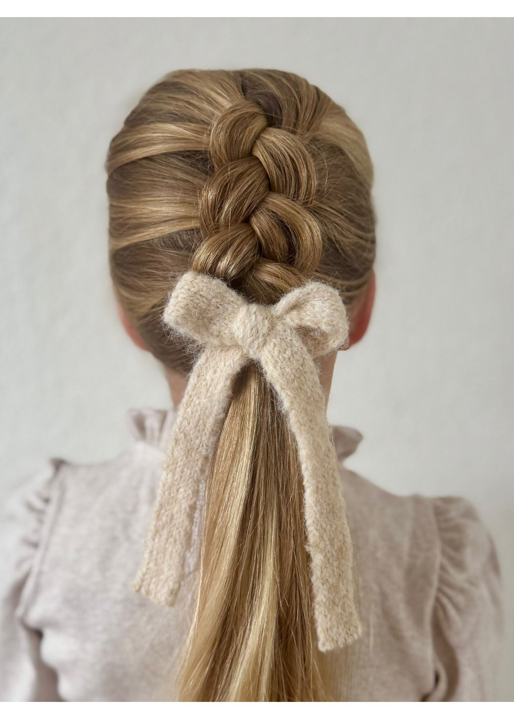 Lange gebreide beige strik 'Poedel'