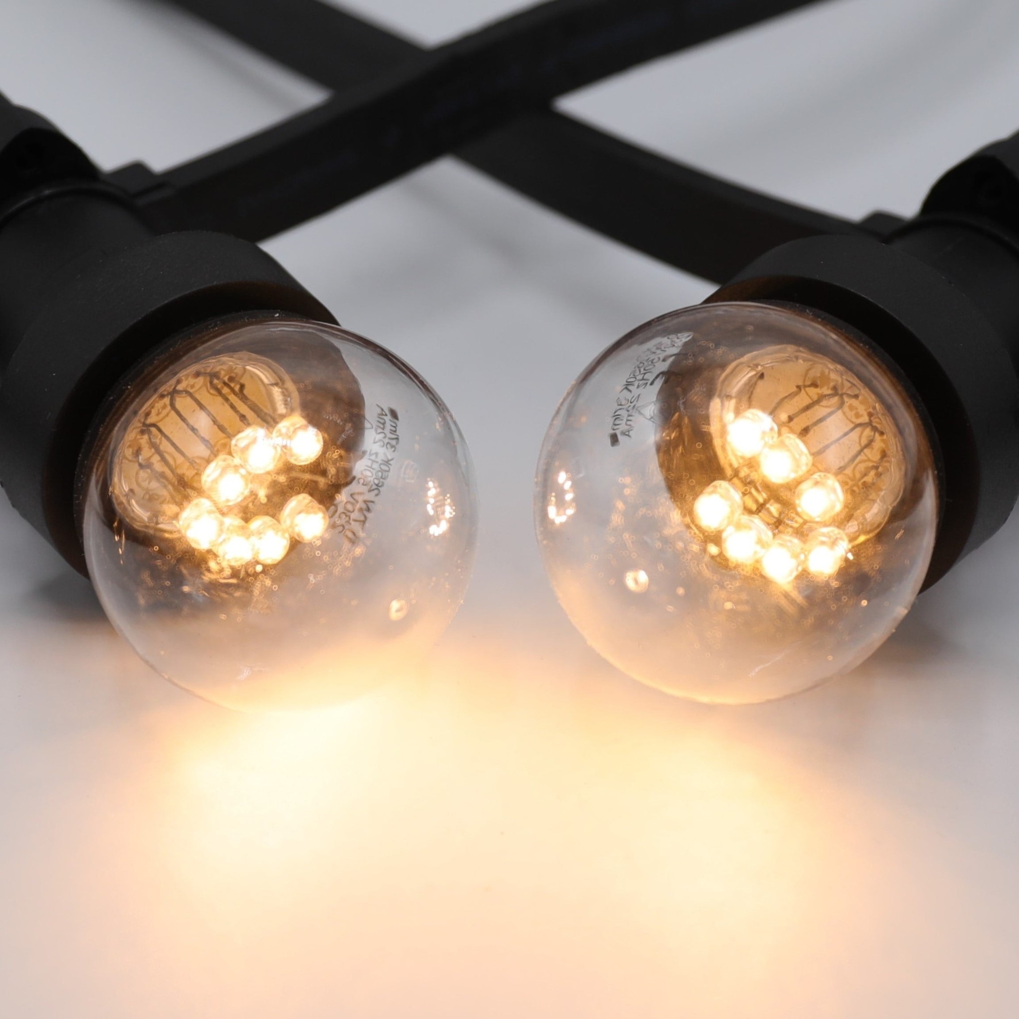 Kit guirlande lumineuse extérieure 10 mètres + 10 ampoules LED E27 1W -  IP44 - Blanc chaud