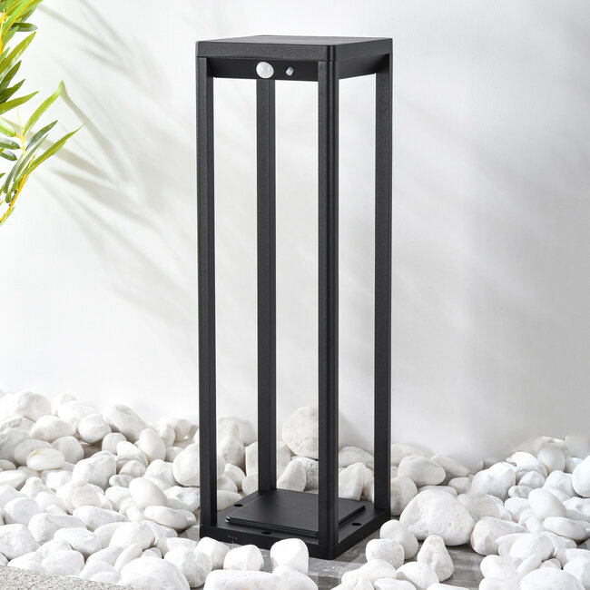 Black freestanding outdoor light with solar power and sensor – Marcello
