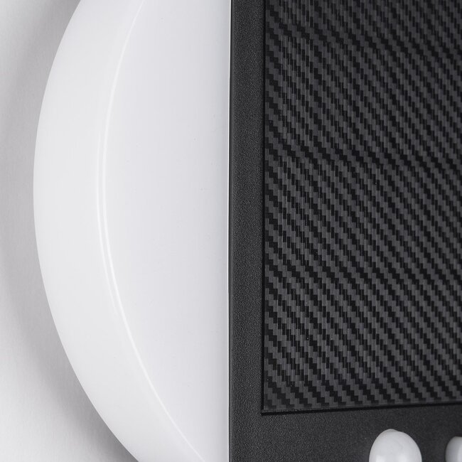 Modern solar wall lamp with sensor black - Blitz