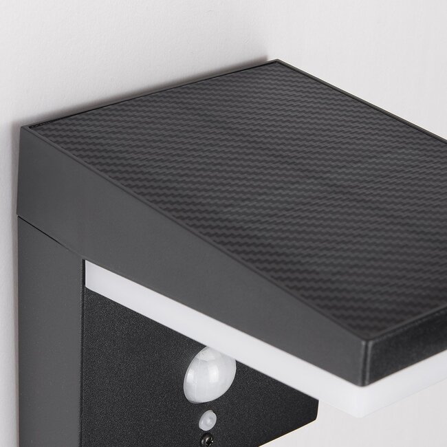 Modern solar wall light in black with sensor - Halo