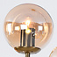 Sette pendant lamp design with amber glass spheres
