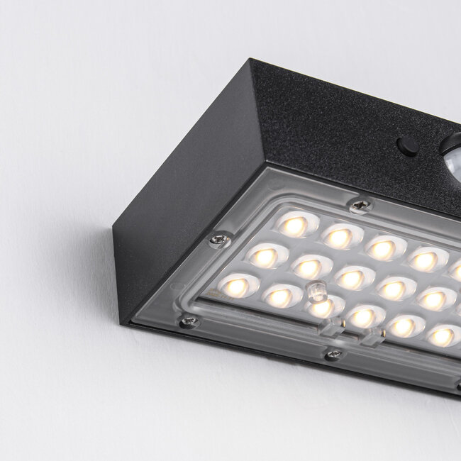Black solar outdoor wall light with sensor - Brock