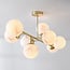 Designer ceiling light Osem gold with marble-effect spheres, 8-light