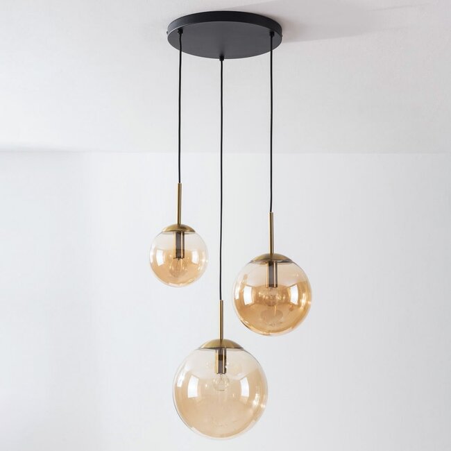 Pendant light Marui with three amber glass spheres and golden accents
