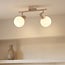 Rotatable ceiling light Phiene with two opal white glass shades - beige