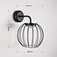 Eclipsa wall lamp design – black with warm white light