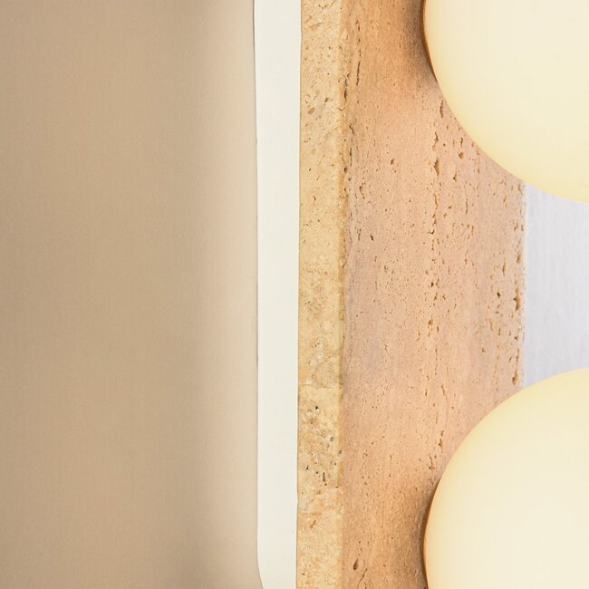 2-light wall lamp Artea in travertine (natural stone) with glass globes