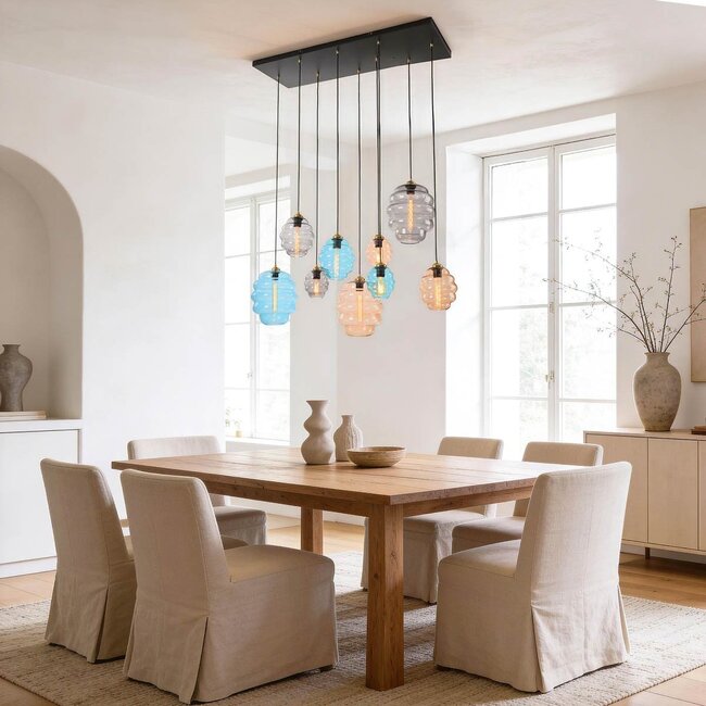 Designer pendant light Zavari with 9 globes in amber, smoked and blue glass