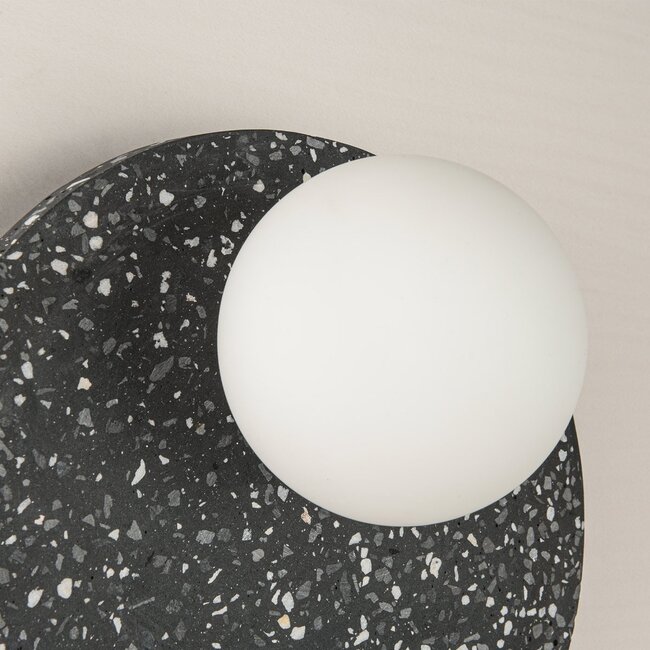 Round wall light made of cement and opal white glass with a dark grey terrazzo look - Vero