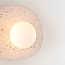 Lucio wall light in travertine (natural stone) with glass globe