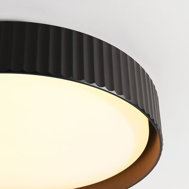 Modern Palomo black ceiling light with ribbed edge and 3-step dimmable LEDs