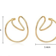 CiciDeJeweleryAMS Geometric 3D eaur cuff, gold plated