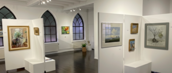 Verlichting die kunst tot leven brengt:  Kunstruimte De Smederij