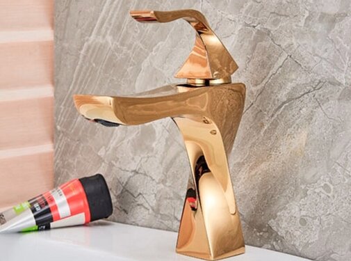 VALISA Gedraaide design wastafel kraan goud