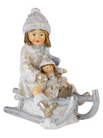 Clayre & Eef Decoratie kind op slee 10*5*10 cm 6PR4665