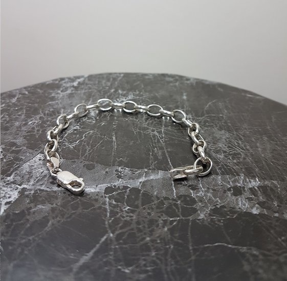 Zilveren rolo schakelarmband