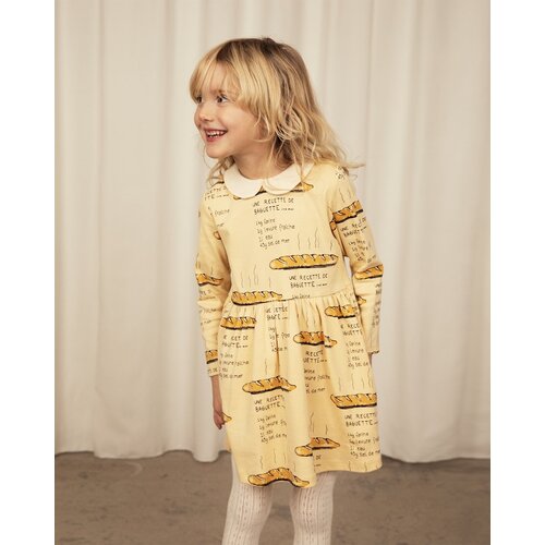 Mini Rodini Geel jurkje met lange mouwen en baguette print