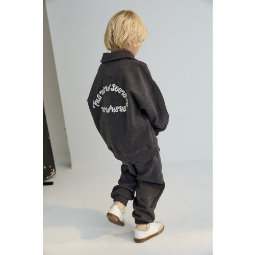 the new society Polo sweater in donker grijs