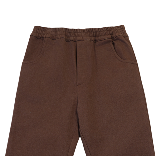 Donsje Stoere broek met zakken in een donker bruine kleur Donsje Stoere broek met zakken in een donker bruine kleur