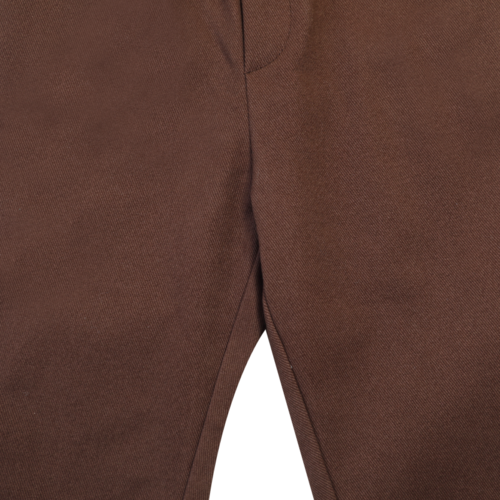 Donsje Stoere broek met zakken in een donker bruine kleur Donsje Stoere broek met zakken in een donker bruine kleur