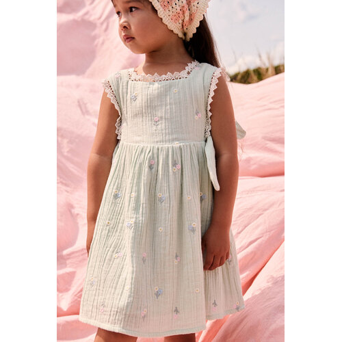 Louise Misha Lichte groene jurk met geboorde details