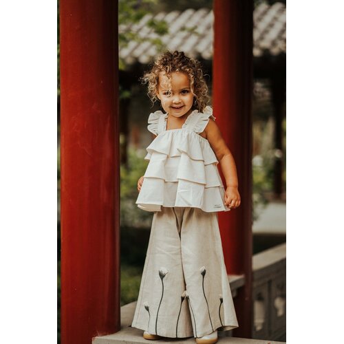 Donsje Mouwloze gelaagde top