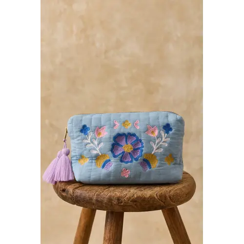 Louise Misha Blauwe toilettas met bloemen print