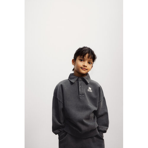 the new society Polo sweater in het zwart