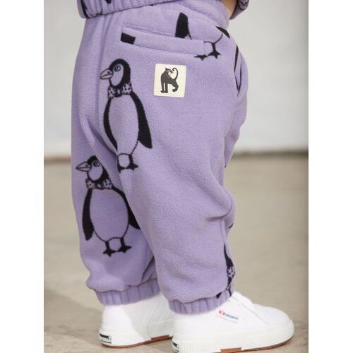 Mini Rodini Paarse fleece broek met all-over pinguïn print