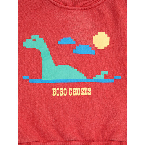 Bobo Choses Rode baby sweater met opdruk