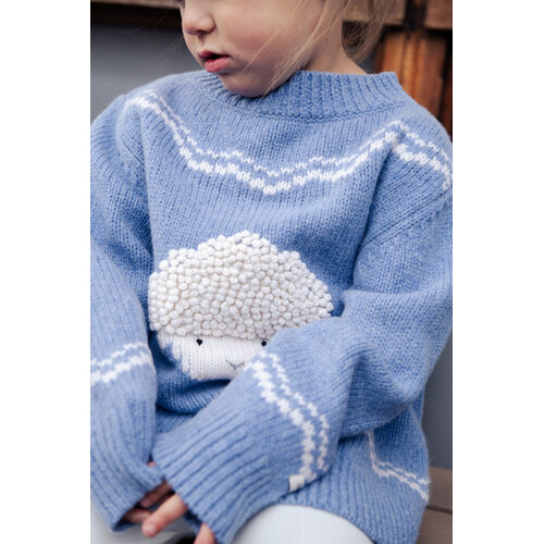 Donsje Merino wollen trui met een lammetje in licht blauw