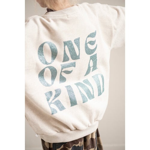 JENEST Beige sweater met glitter opdruk JENEST Beige sweater met glitter opdruk