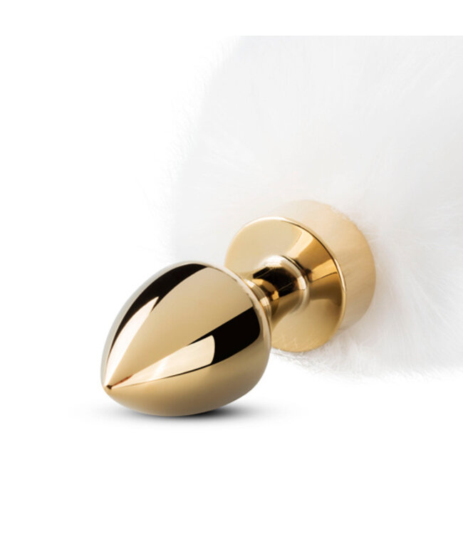 Kleine goudkleurige buttplug met witte vossenstaart