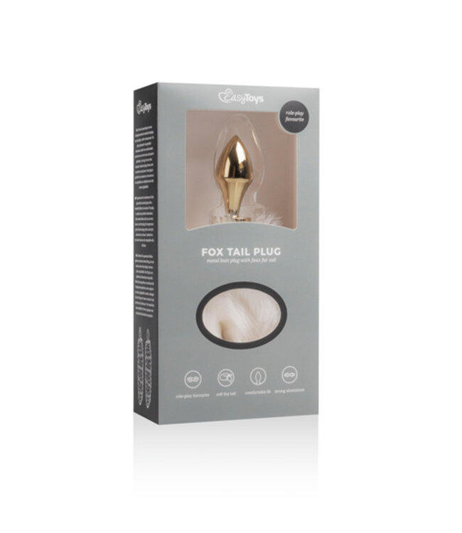 Kleine goudkleurige buttplug met witte vossenstaart