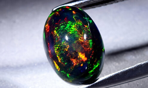 Mag een opaal met water in aanraking komen?