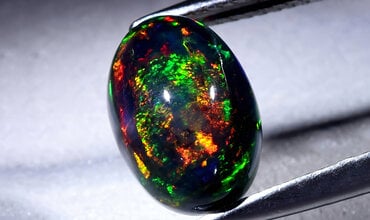 Can an opal come into contact with water?