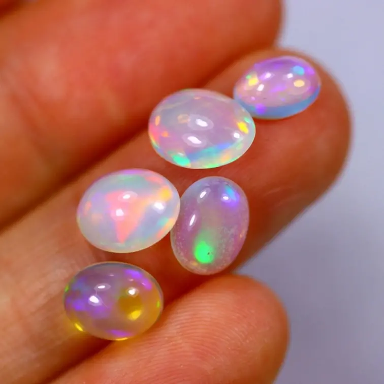 Jeu de Opales Welo d'Éthiopie - "Birth of Universes" - (8,9 x 6,7 x 3,6 mm - 4,34 carats) - POC-0647