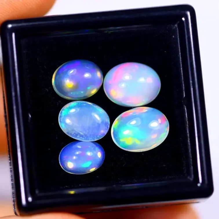 Satz mit Äthiopische Welo-Opale - "Birth of Universes" - (8,9 x 6,7 x 3,6 mm - 4,34 Karat) - POC-0647