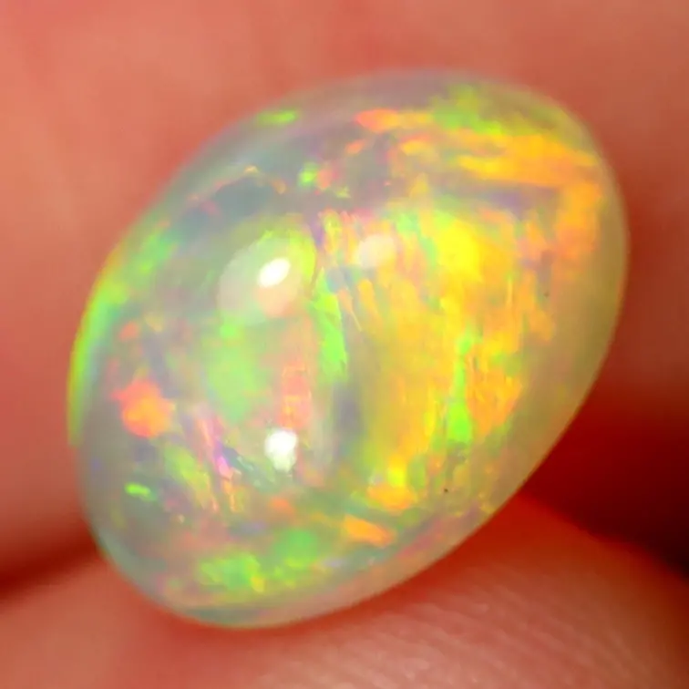 Opale Welo naturelle d'Ethiopie - « Royalty Gem » - 8.8 x 6.8 x 4.5 mm - 1.35 carats - POC-0703