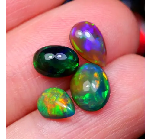 Natural Smoked Ethiopian Welo Opals - ‘Underwater System’ - 8 x 6 x 3 - 2.49 carats mm - POC-0925ked Ethiopian Welo Opals - ‘Solar System’ - 9.2 x 7 x 3.4 mm - 3.30 carats - POC-0924 - Copy