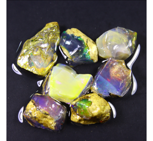 Raw Ethiopian Welo opal set - ‘Meteor Strike’ - 213 karaat