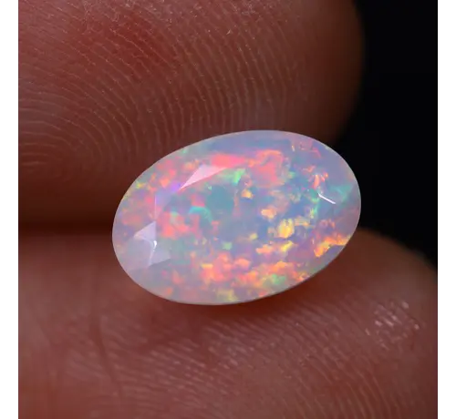 Natuurlijke Ethiopische Welo Opaal - "Iridescent Prism" - 4.8 x 10.2 x 6.9 mm - 1.38 karaat