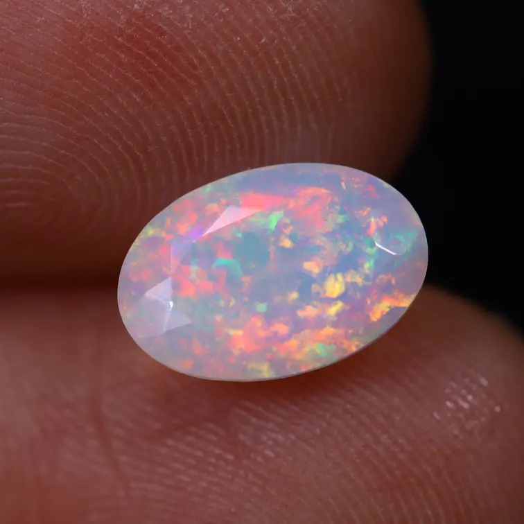Natuurlijke Ethiopische Welo Opaal - "Iridescent Prism" - 4.8 x 10.2 x 6.9 mm - 1.38 karaat