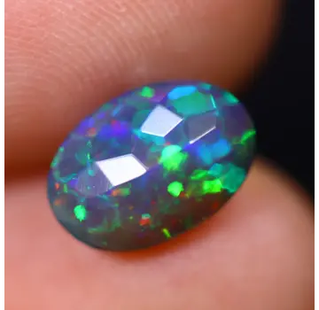 Äthiopischer Welo - Geräucherter Opal "Smoky Emerald Veil" - (10.4 x 7.3 x 4.2 mm - 1.52 Karat)