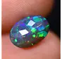 Äthiopischer Welo - Geräucherter Opal "Smoky Emerald Veil" - (10.4 x 7.3 x 4.2 mm - 1.52 Karat)