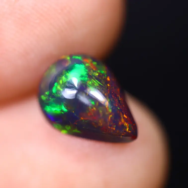 Ethiopian Welo - Smoked Opal "Smoked Aurora Drop" - (10.2 x 7.3 x 4.9 mm - 1.52 carat)