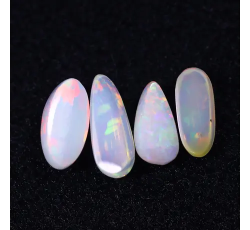 Natürliche Äthiopische Welo Opal - "Iridescent Welo Cascade" - 14.6 x 6.2 x 5.4 mm - 12.63 Karat