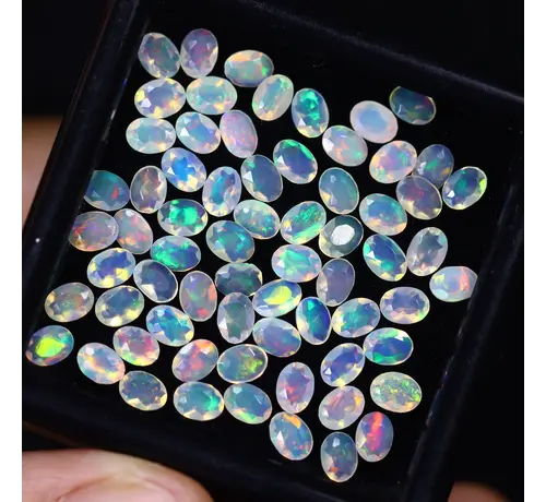 Opale Welo etiope naturale - "Prismatic Veil" - 5.2 x 4.1 x 2.6 mm - 8.28 carati