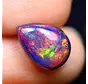 Ethiopian Welo - Smoked Opal "Ember Veil" - (10.8 x 7.6 x 3.8 mm - 1.58 carat)